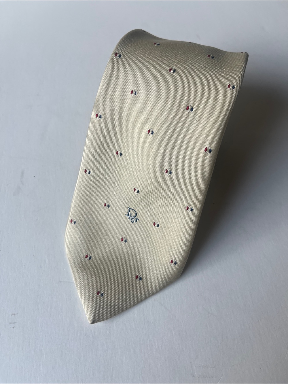 Christian Dior vintage poly/silk tan men’s tie.